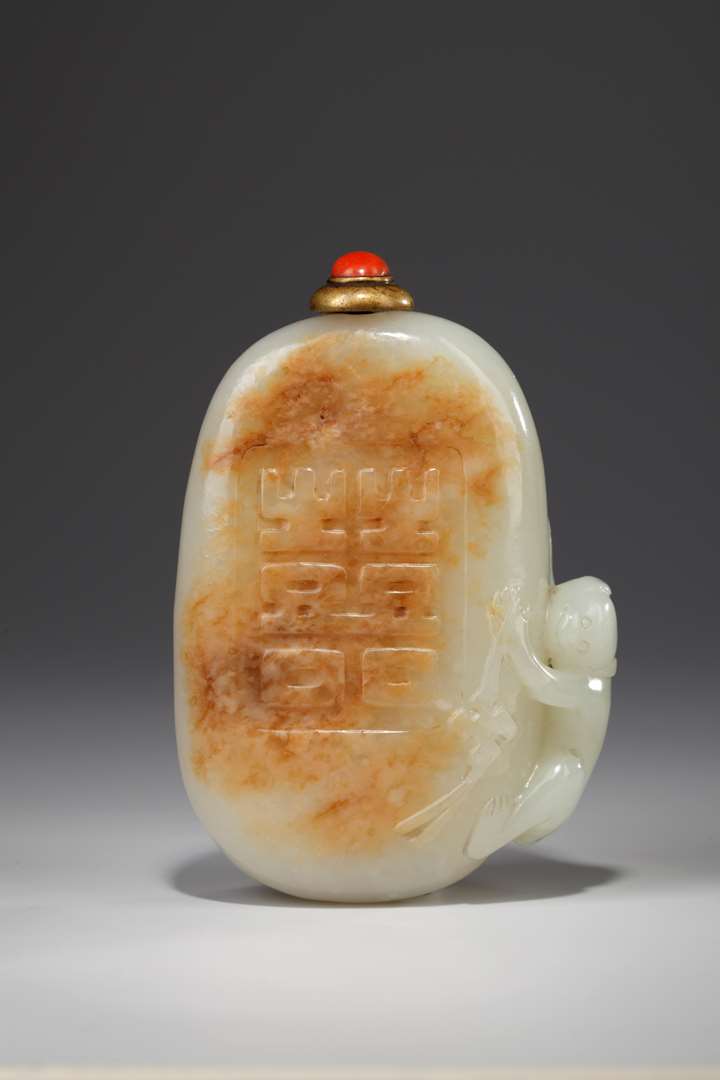 Superb jade snuff bottle sculpted with "Shuang xi" sign and a monkey